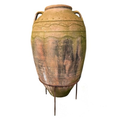 Lot 616 - A large terracotta olive jar.