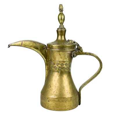 Lot 30 - A large Saudi Arabian brass dallah pot, 19th century.