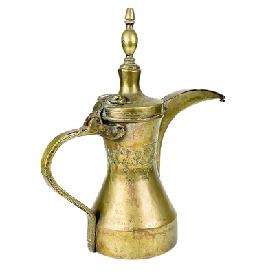 Lot 30 - A large Saudi Arabian brass dallah pot, 19th century.