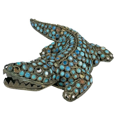 Lot 501 - A Tibetan white metal turquoise set model of a crocodile.