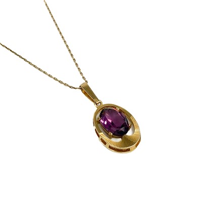 Lot 32 - A 1970's 9ct gold amethyst set pendant necklace.