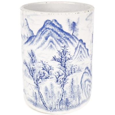 Lot 273 - A Chinese blue and white landscape brush pot, 19th century.