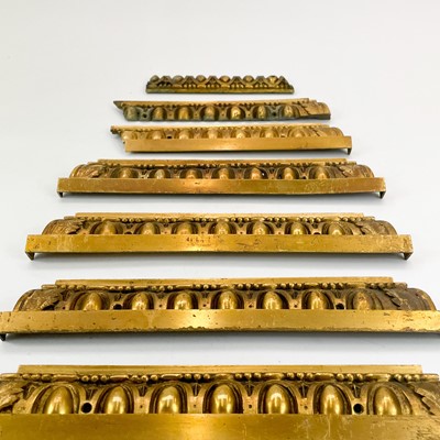 Lot 148 - Eleven decorative brass moulding sections/