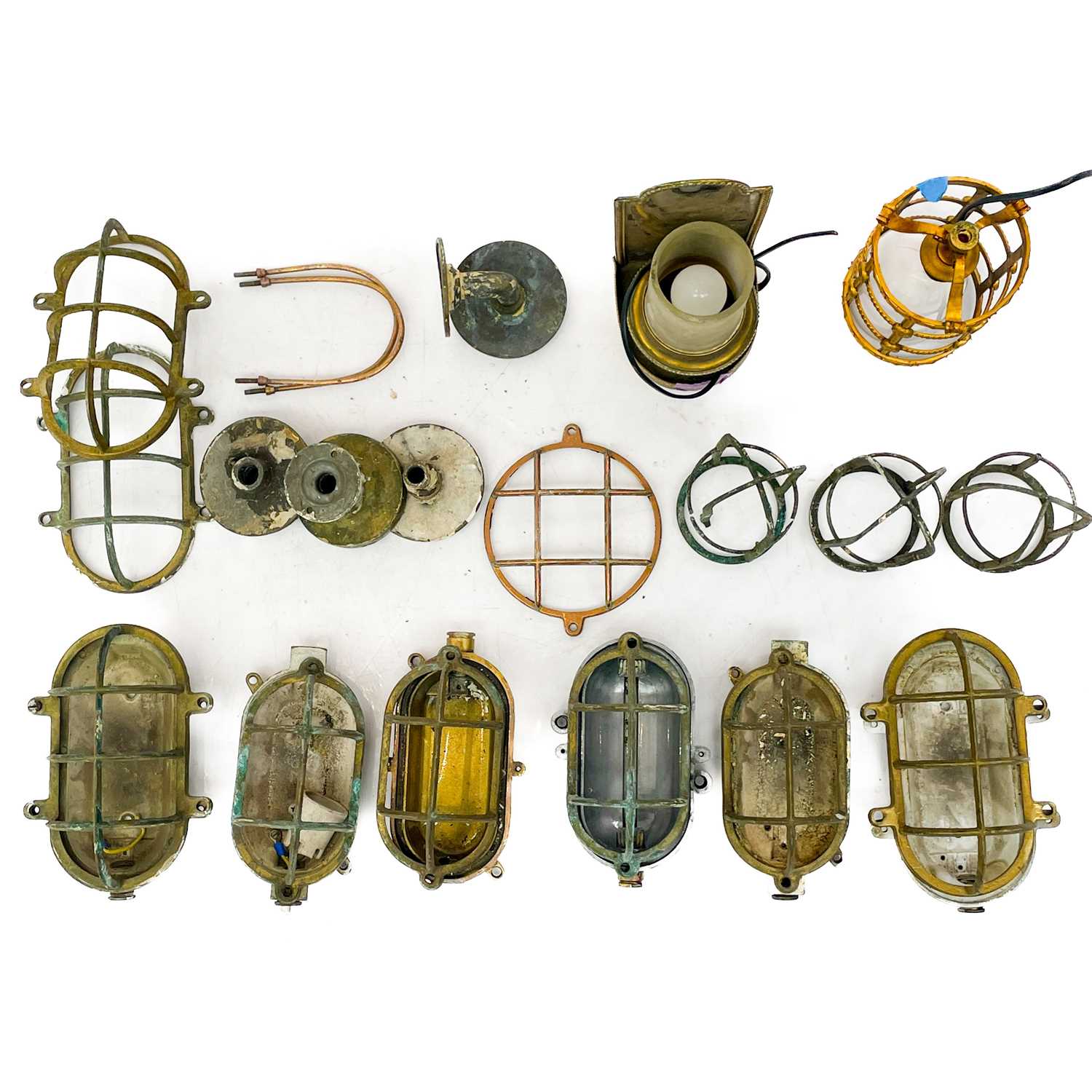 Lot 78 - A collection of marine bulkhead light fitting carcasses.