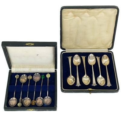 Lot 261 - A box of six silver demitasse spoons.