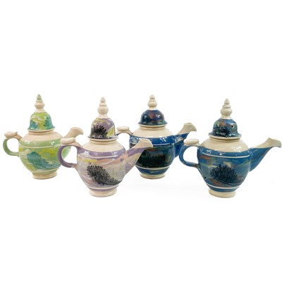 Lot 893 - Four Boscastle pottery teapots along with other Boscastle pottery items.