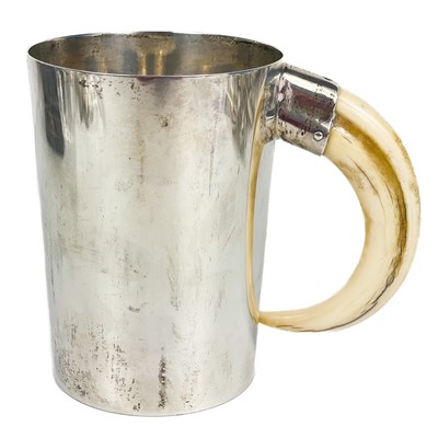 Lot 356 - An Edwardian silver mug with boar's tusk handle by Joseph Rodgers & Sons.