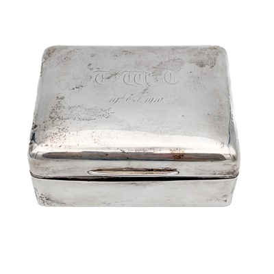 Lot 230 - An Edwardian silver cigarette box by William Comyns.