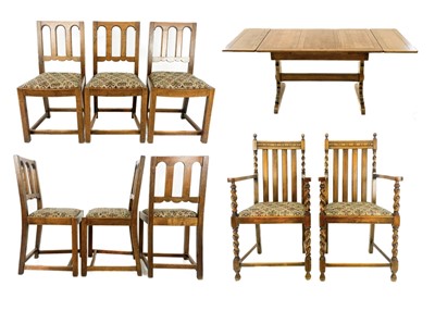 Lot 1931 - An oak draw leaf dining table and six chairs.