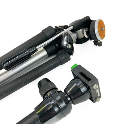 Lot 171 - A Nikkormat manual camera together with other camera attachments.