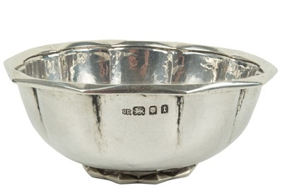 Lot 78 - Omar Ramsden - A George V silver Arts & Crafts lobed sugar bowl by Omar Ramsden.