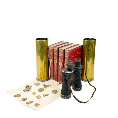 Lot 410 - Military Cap Badges, Shell Cases, Binoculars & Great War Reference Books.