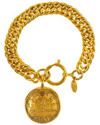 Lot 333 - A Chanel gold tone medallion pendant bracelet.