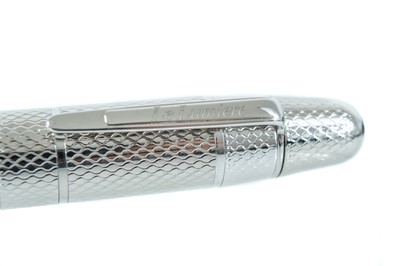 Lot 318 - A Le Lumiere `Diamonds of Light`  range ballpoint pen, set with a VS diamond.