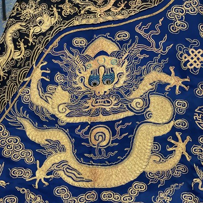 Lot 42 - A Chinese embroidered dragon robe, late 19th century.