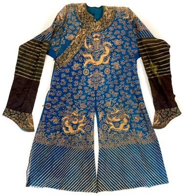 Lot 46 - A Chinese silk embroidered dragon robe, late 19th/early 20th century.