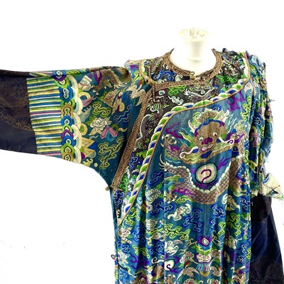 Lot 48 - A Chinese silk embroidered dragon robe, late 19th/early 20th century.