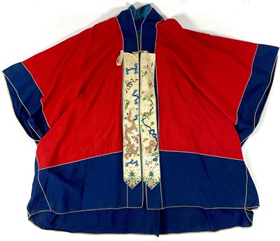 Lot 51 - A large Chinese embroidered robe, 19th/early 20th century.