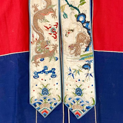 Lot 51 - A large Chinese embroidered robe, 19th/early 20th century.