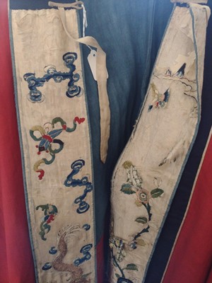 Lot 51 - A large Chinese embroidered robe, 19th/early 20th century.