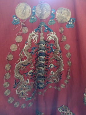 Lot 51 - A large Chinese embroidered robe, 19th/early 20th century.