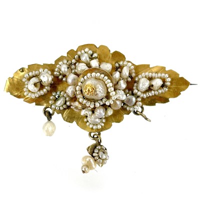 Lot 243 - A 19th century, possibly Indian, high purity gold and pearl set brooch.