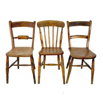 Lot 1964 - An Oxford type beech and elm kitchen chair.