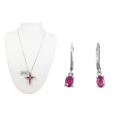 Lot 62 - A sterling silver Madagascan ruby and white topaz cross pendant necklace by Gemporia.