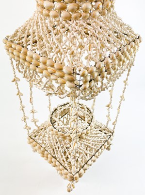 Lot 39 - A cowrie shell plant holder circa 1970