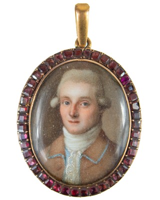 Lot 58 - A Georgian rose gold garnet set portrait miniature pendant.