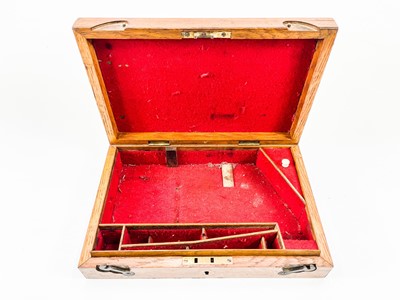 Lot 26 - A Victorian oak pistol box.