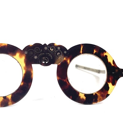 Lot 53 - A cased pair of Chinese tortoiseshell spectacles, early 20th century.