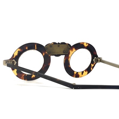 Lot 53 - A cased pair of Chinese tortoiseshell spectacles, early 20th century.