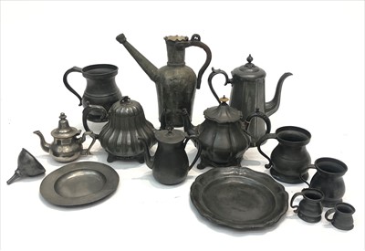 Lot 225 - A collection of pewter to include a wine...