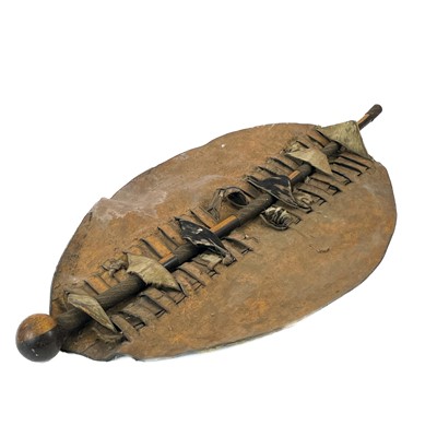 Lot 85 - An African hide shield and knobkerrie.