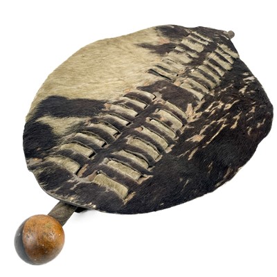 Lot 85 - An African hide shield and knobkerrie.