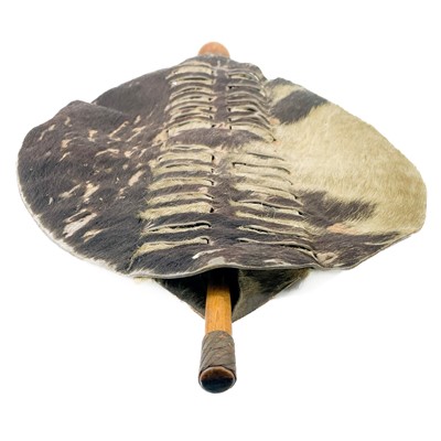 Lot 85 - An African hide shield and knobkerrie.