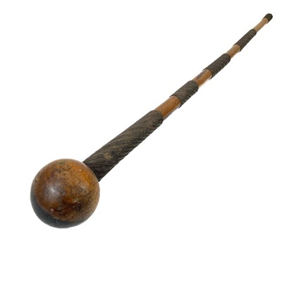 Lot 85 - An African hide shield and knobkerrie.