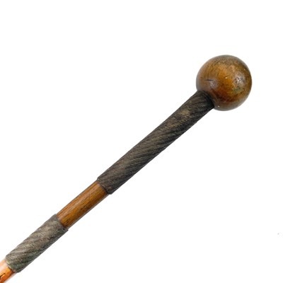 Lot 85 - An African hide shield and knobkerrie.