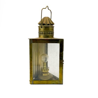 Lot 81 - A brass wardroom lamp by Eli Griffiths, 1915.