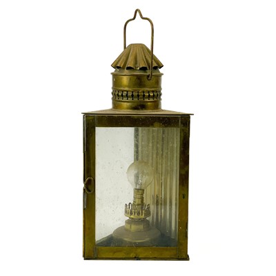 Lot 81 - A brass wardroom lamp by Eli Griffiths, 1915.