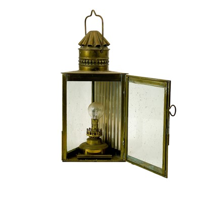 Lot 81 - A brass wardroom lamp by Eli Griffiths, 1915.