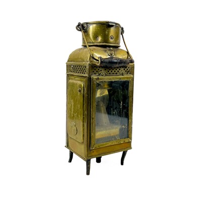 Lot 81 - A brass wardroom lamp by Eli Griffiths, 1915.