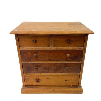 Lot 207 - A small Victorian pine collector's chest.