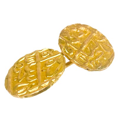 Lot 83 - A high purity gold Islamic double coin cuff link.