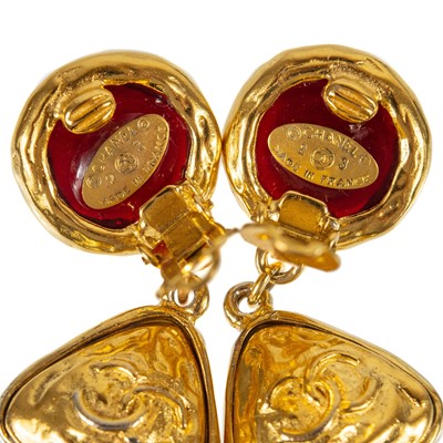 Lot 366 - A pair of Chanel red Gripoix clip earrings.