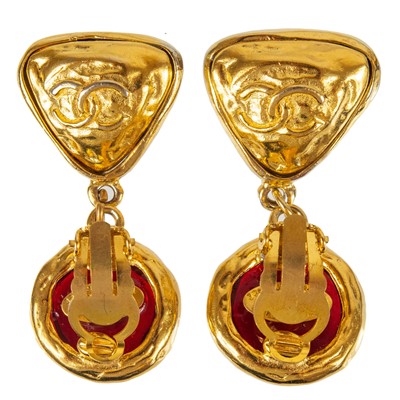 Lot 366 - A pair of Chanel red Gripoix clip earrings.