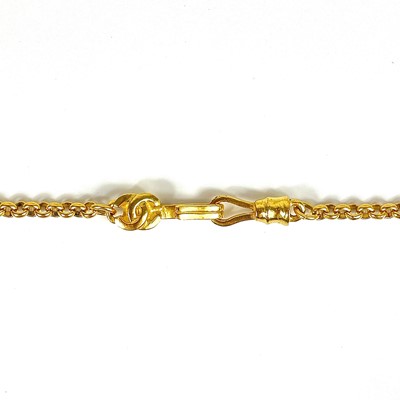 Lot 356 - A Chanel brown stone set pendant necklace.