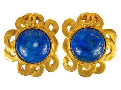 Lot 372 - A pair of Chanel Gripoix lapis lazuli set clip earrings.