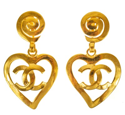 Lot 367 - A Chanel desirable heart shaped pendant clip earrings from the 'Barbie' collection.